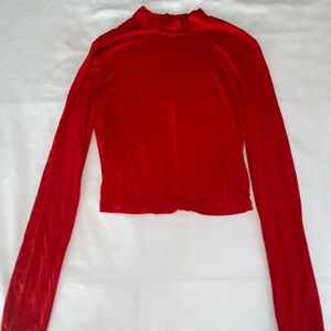 Cropped red long sleeve high neck top